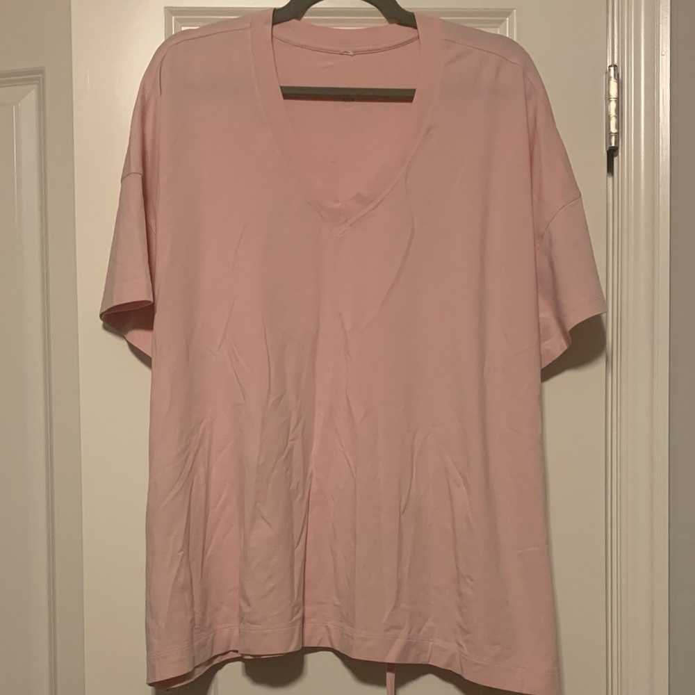 Lululemon Pink V-Neck Tee w/ tie back, Sz 16
Good Condition